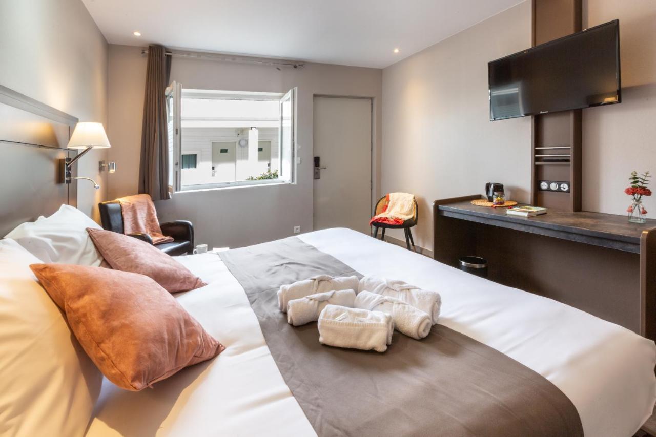 Hotel Grand Confort Le Moulin Rouge Terrasson Buitenkant foto
