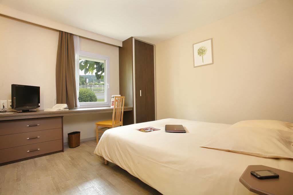 Hotel Grand Confort Le Moulin Rouge Terrasson Kamer foto